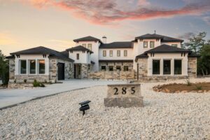 pressure washing modern luxury home exterior in Austin Texas